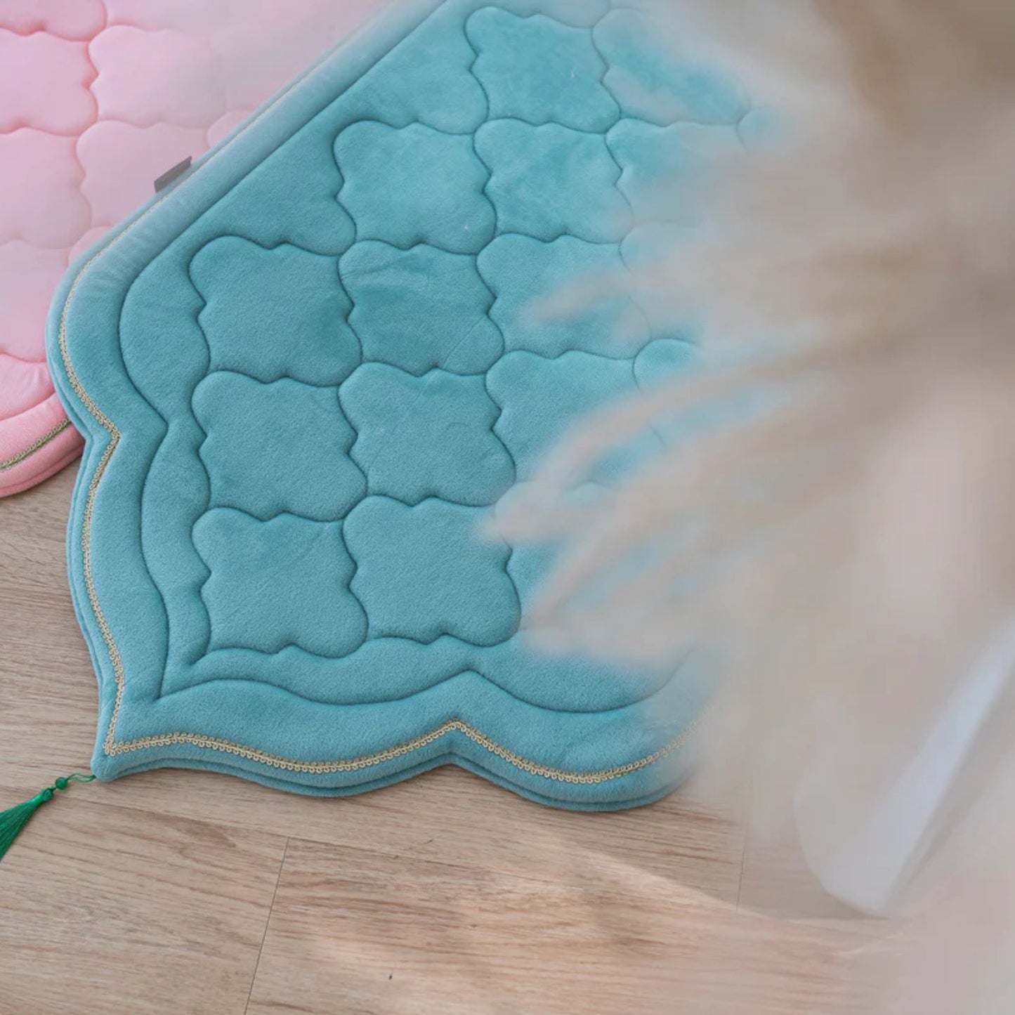 Soft turquoise and pink foam padded prayer mats with elegant stitching and tassel design by Islamify