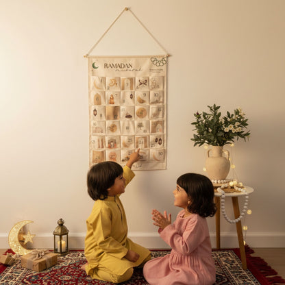 Two Muslim children celebrating Ramadan using a hanging Ramadan countdown calendar with Islamic decor and lanterns