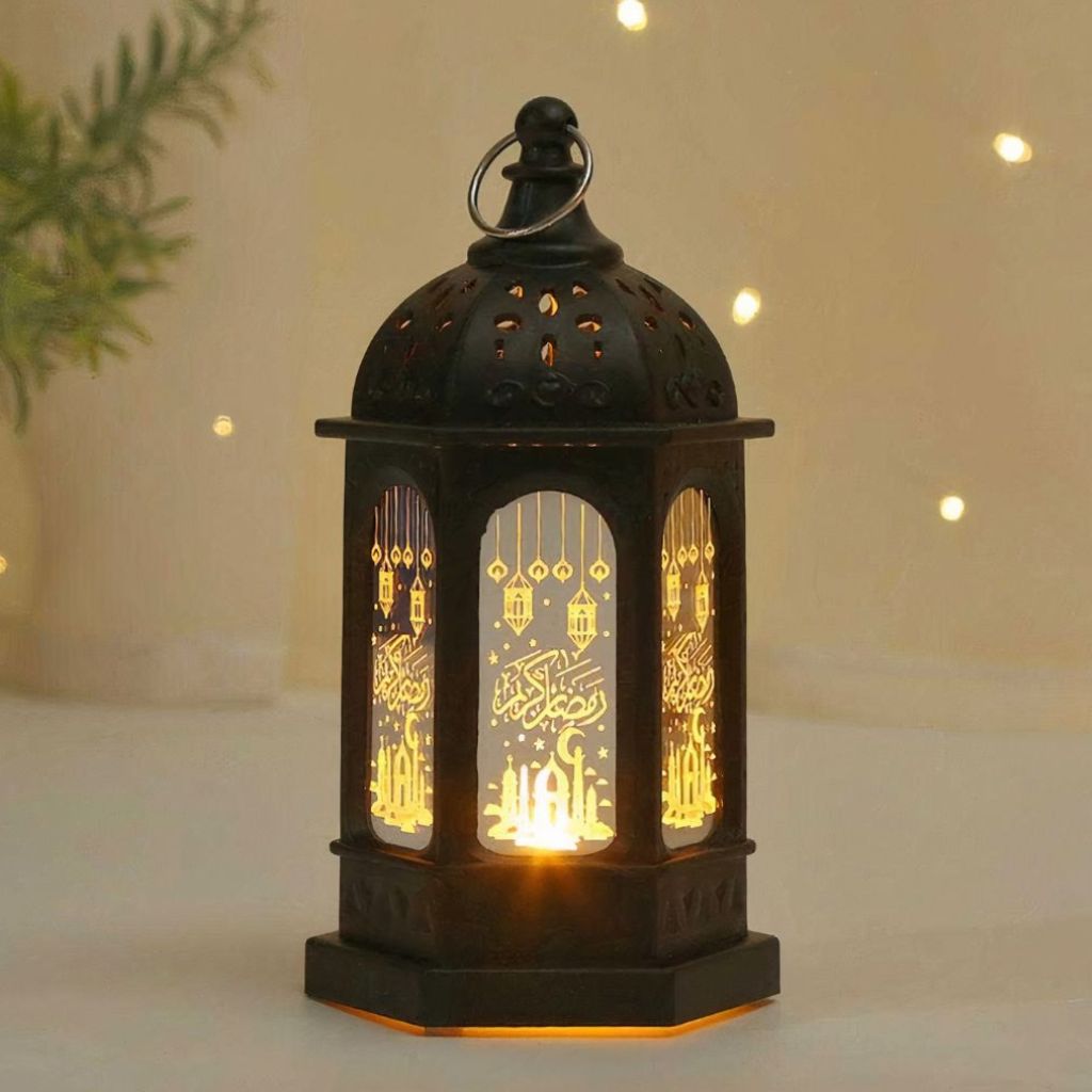 Black Ramadan Fanouz lantern with glowing Arabic calligraphy and mosque design by Islamify