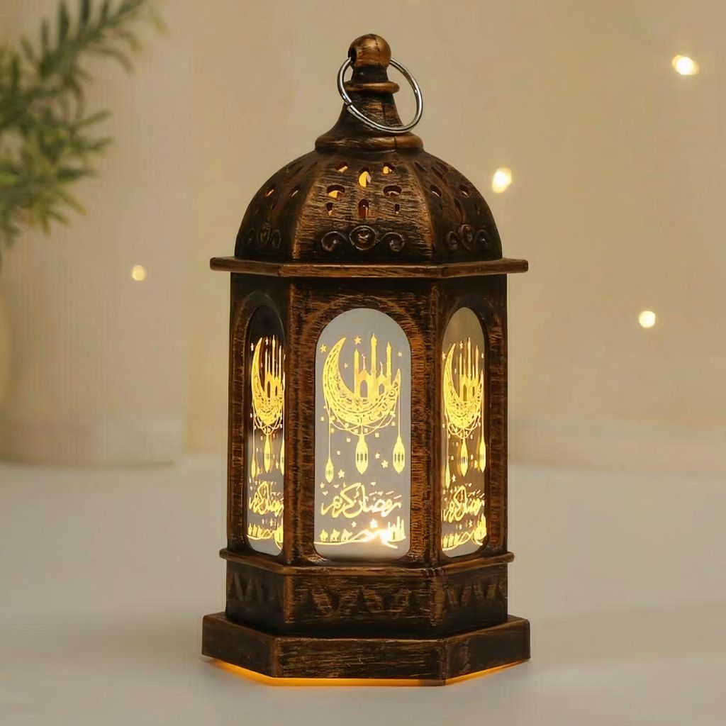 Bronze Ramadan Fanouz lantern with crescent moon design and warm golden light by Islamify
