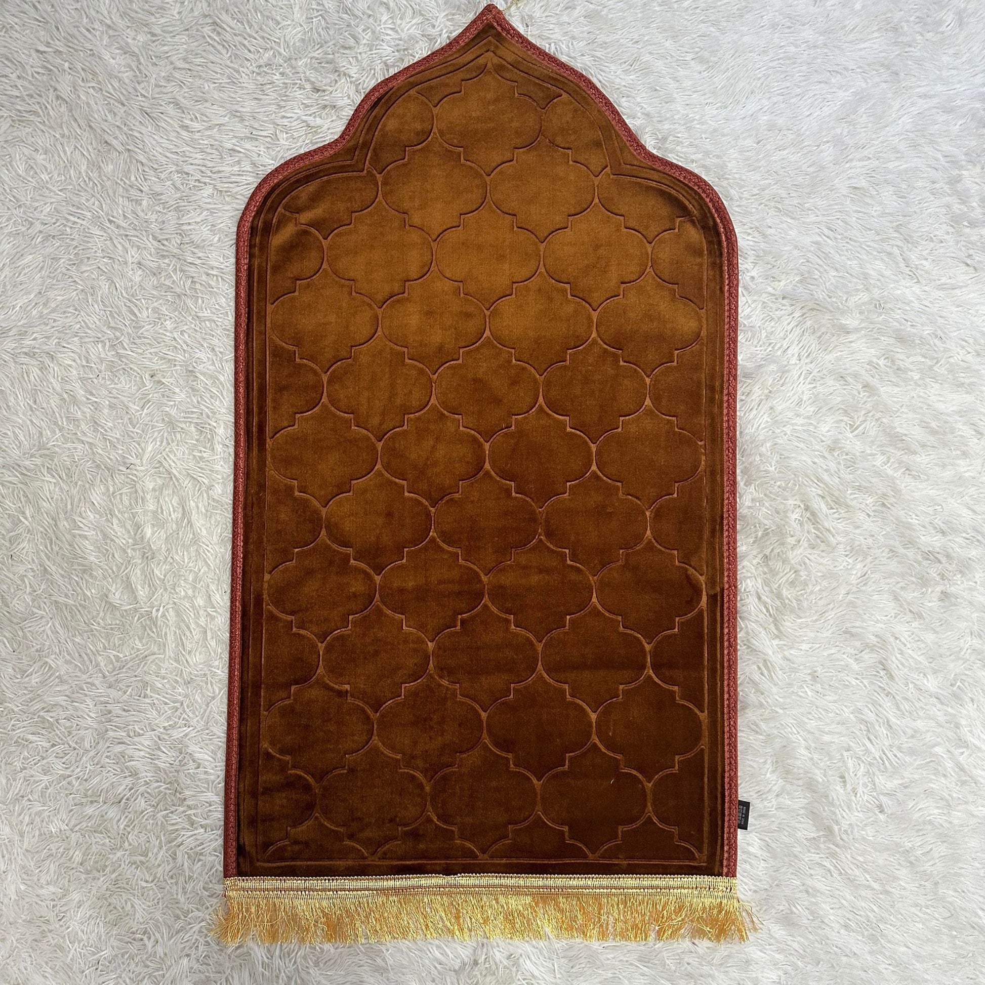 Chocolate brown Islamify foam padded prayer mat with gold tassel and geometric velvet pattern