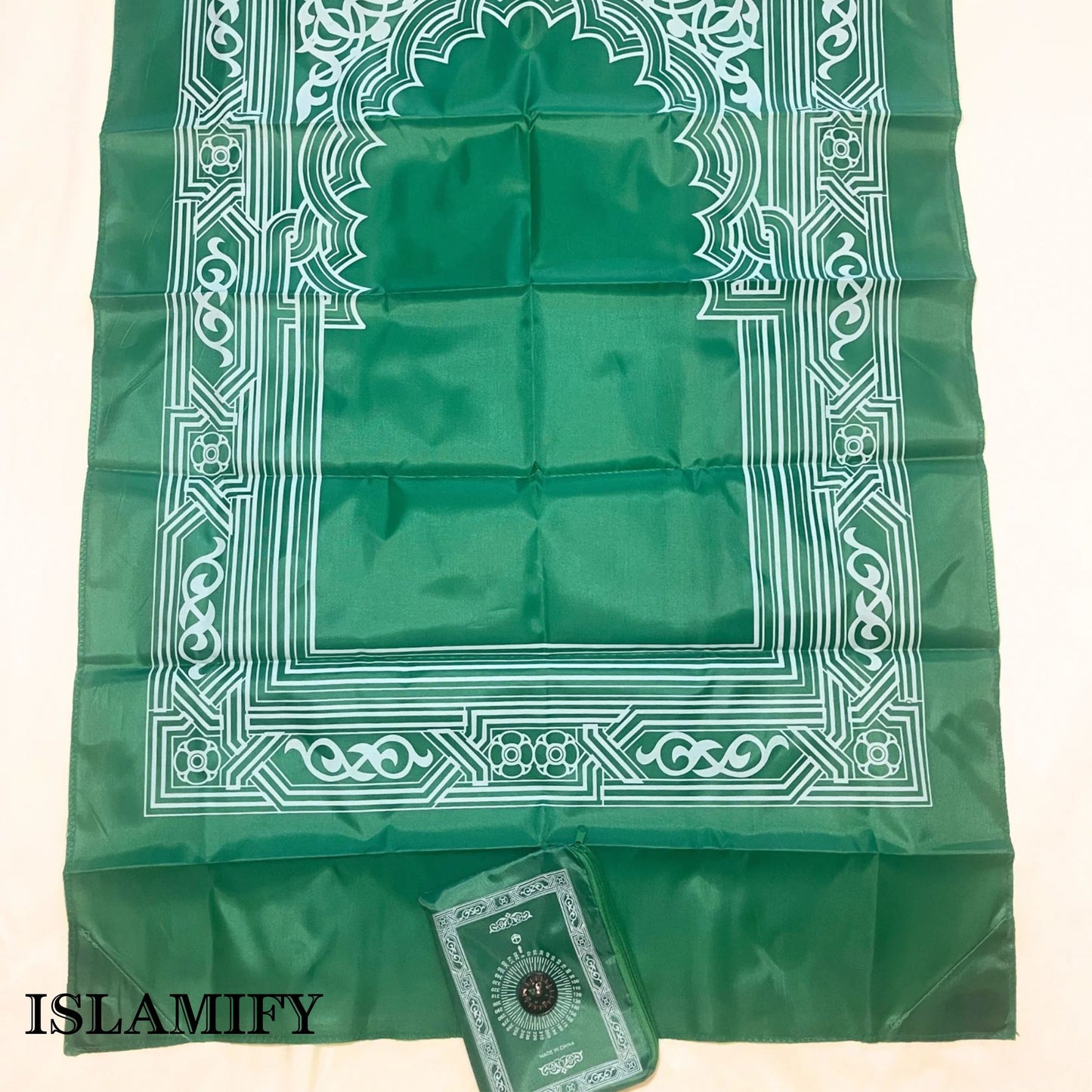 Green PocketPray portable prayer mat with matching compass pouch by Islamify – lightweight foldable Muslim travel prayer mat