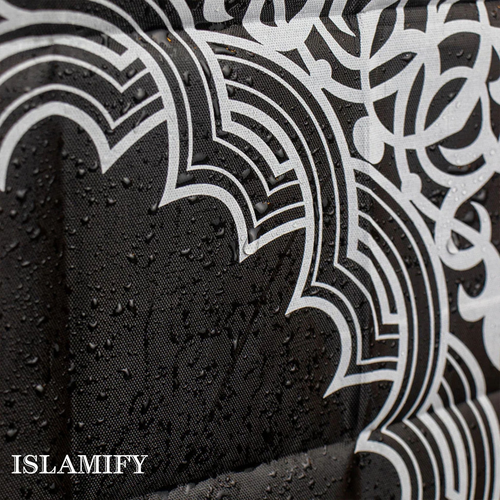 Close-up of PocketPray portable prayer mat with waterproof surface and elegant Islamic geometric pattern by Islamify