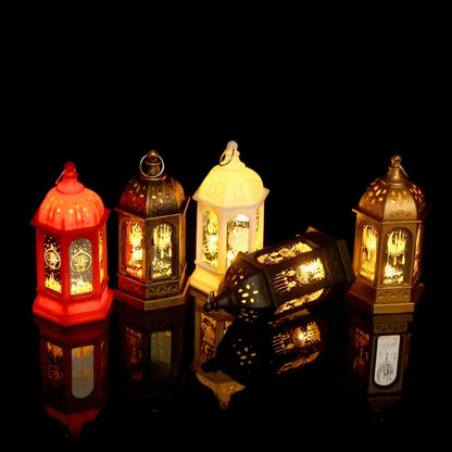 A colorful set of glowing Ramadan Fanouz lanterns in red, gold, white, and bronze, beautifully lit for Islamic home decor by Islamify