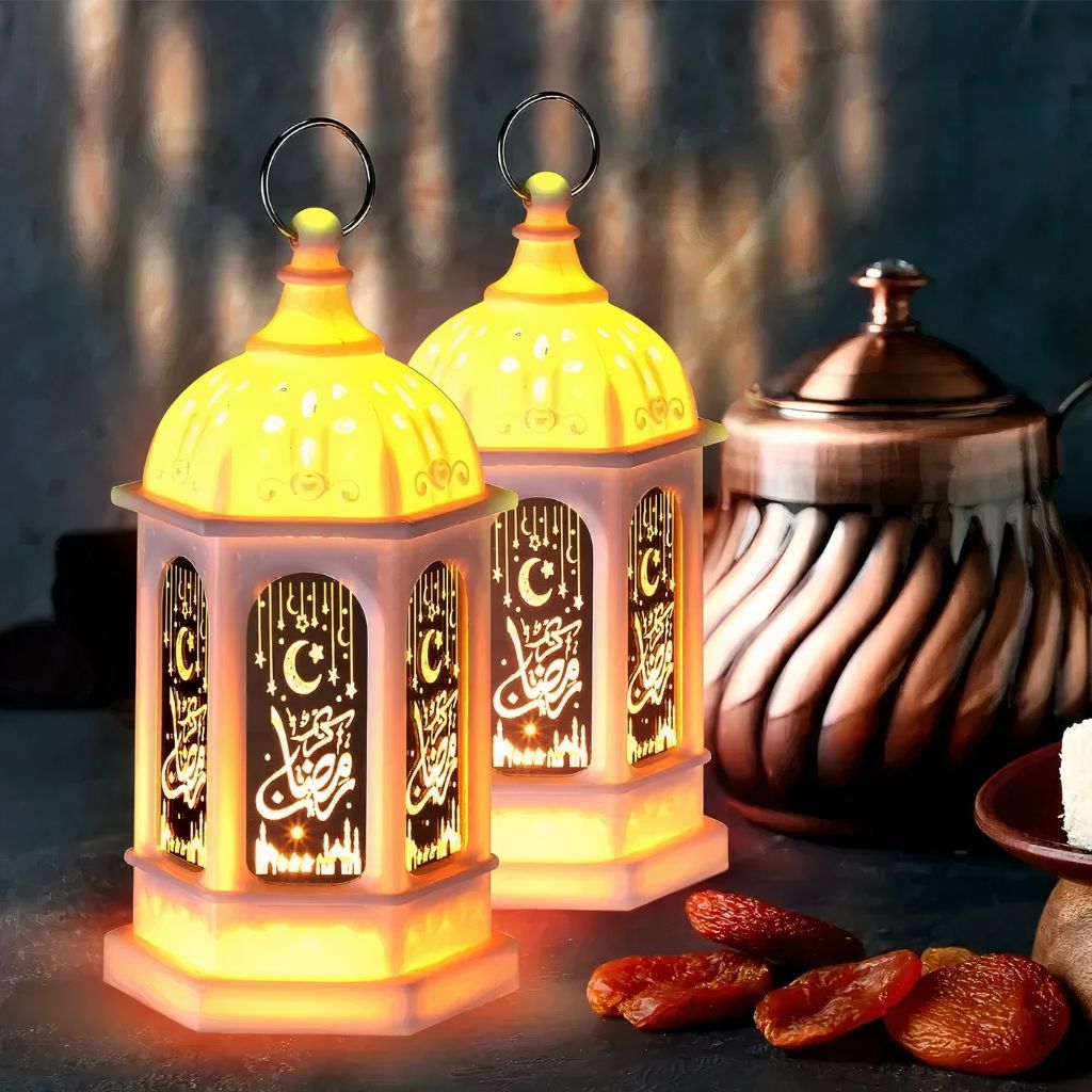 Two glowing Ramadan Mini Fanouz lanterns with crescent moon and Arabic calligraphy design by Islamify, perfect for Ramadan home decor