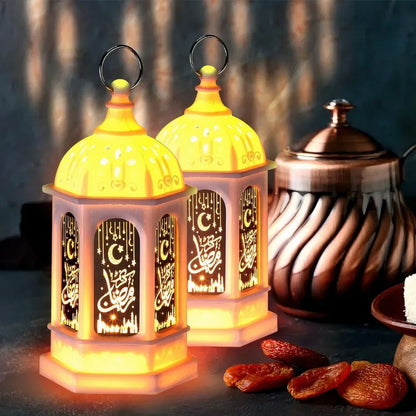 Two glowing Ramadan Mini Fanouz lanterns with crescent moon and Arabic calligraphy design by Islamify, perfect for Ramadan home decor