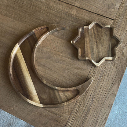 Wooden crescent moon and star-shaped serving plates on a wooden table – Ramadan and Eid decor from Islamify